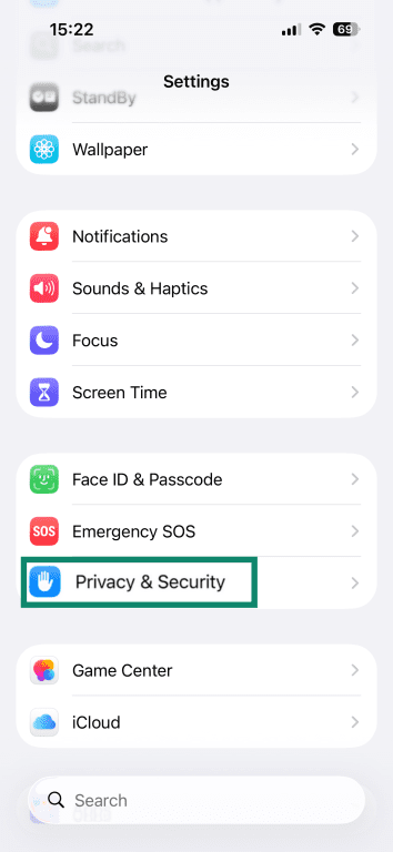 'Privacy & Security' option highlighted in the iPhone settings screen.
